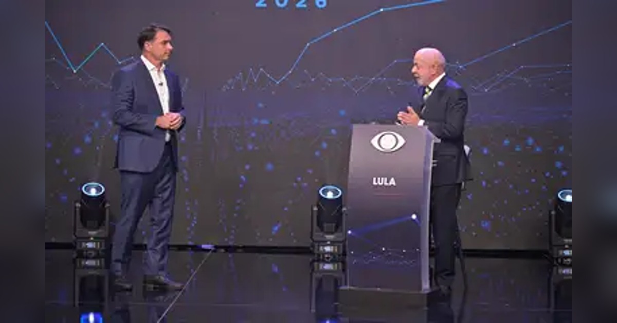 Luiz Inácio Lula da Silva e Flávio Bolsonaro no debate da Band, em 18 de outubro de 2026